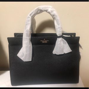 Selling a brand new Kate Spade purse.
